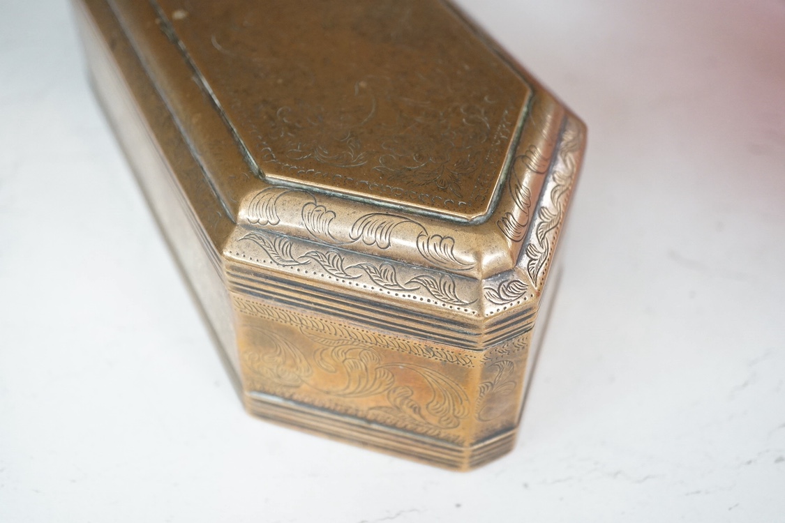 A Persian brass pen box with engraved foliate decoration, 24cm wide. Condition - fair/good